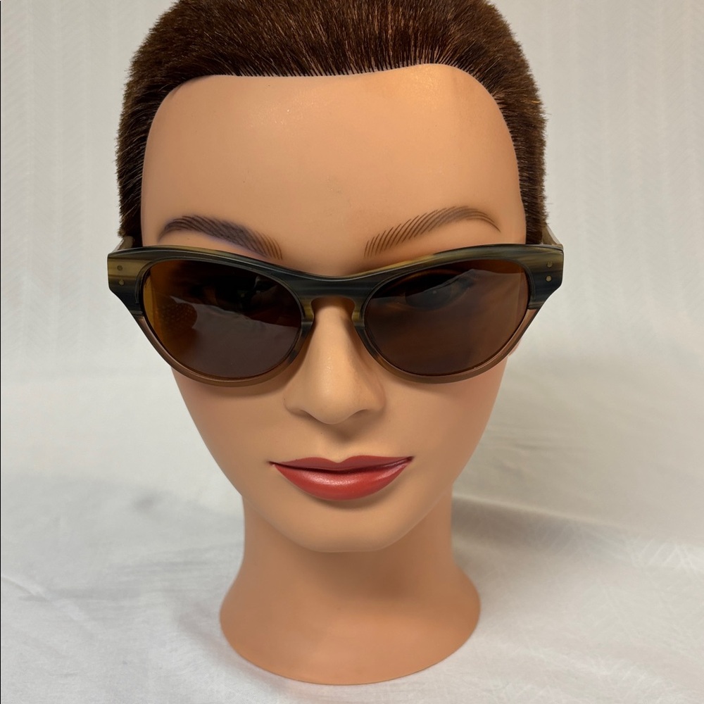 The Coco and Breezy Carmen 102 sunglasses are a cat-eye style frame.